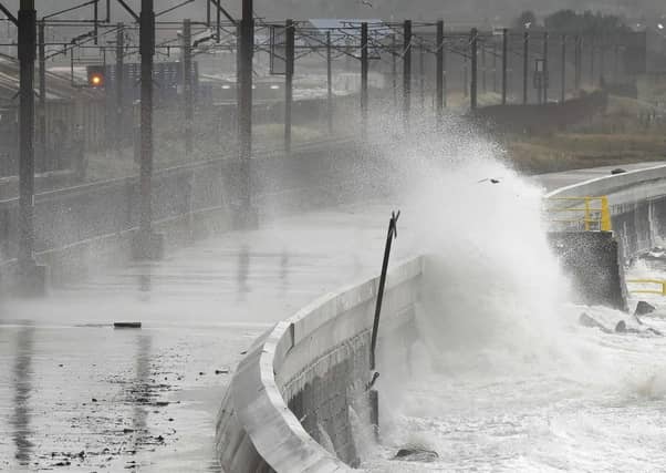 Waves crash over the breakwater as the remnants of Hurricane Ophelia hit Saltcoats on the west coast of Scotland on the morning of 17th October 2017.
Picture; Getty