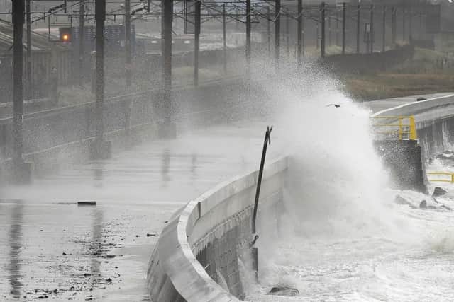 Waves crash over the breakwater as the remnants of Hurricane Ophelia hit Saltcoats on the west coast of Scotland on the morning of 17th October 2017.
 Picture; Getty