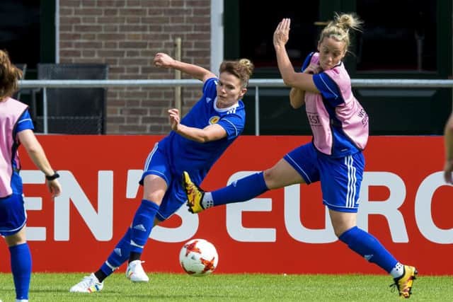 o Love, left, is Scotlands most experienced player in the current squad and  was a team-mate of coach Shelley Kerr. Picture: SNS.