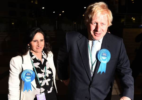 Boris Johnson and his wife Marina arrive at the General Election count at Brunel University in London.