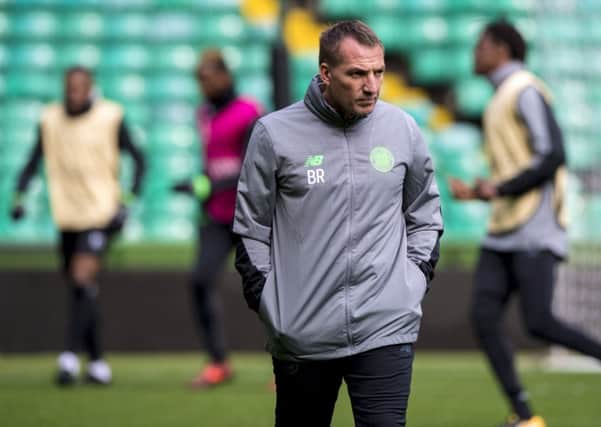 Brendan Rodgers appeared to admit that he is on the lookout for defensive reinforcements. Picture: SNS Group