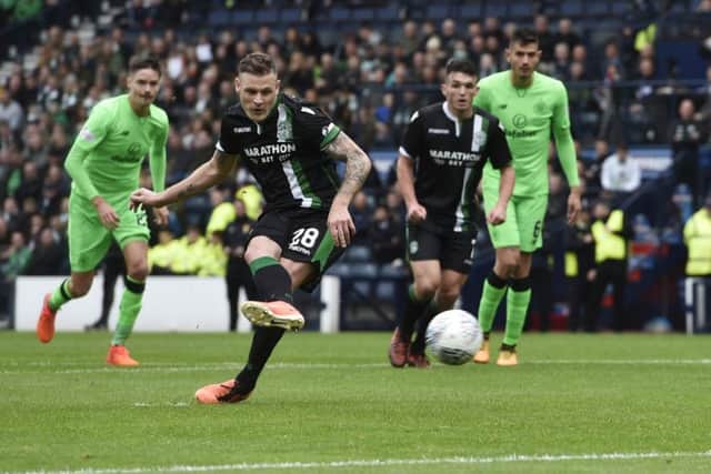 Anthony Stokes strokes home a penalty to bring Hibs back into it. Picture: Rob Casey/SNS