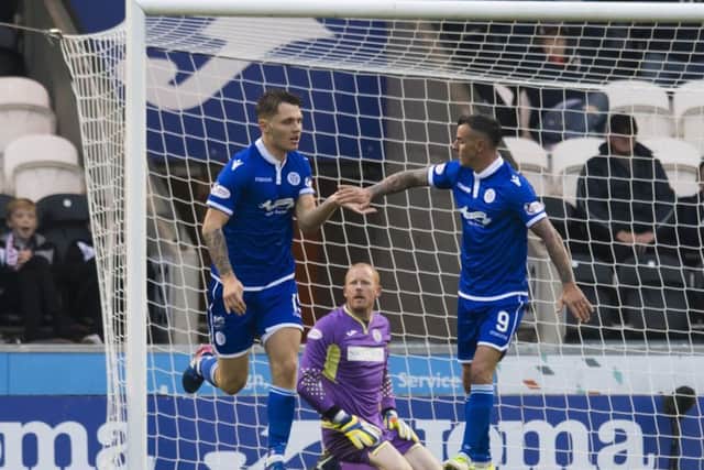 Jason Kerr (left) scored the only goal as Queen of the South defeated Brechin City. He was later sent off. Picture: SNS/Craig Williamson