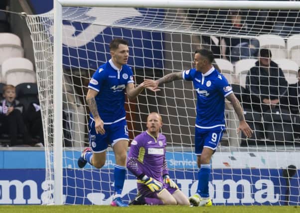 Jason Kerr (left) scored the only goal as Queen of the South defeated Brechin City. He was later sent off. Picture: SNS/Craig Williamson