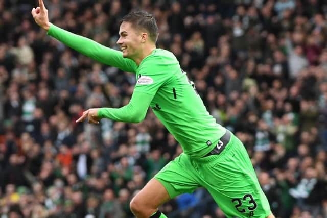 Mikael Lustig celebrates his second goal in Celtic's defeat of Hibs on Saturday. Picture: SNS.