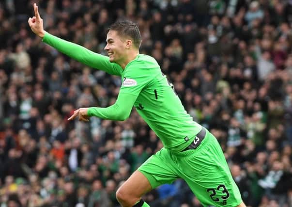 Mikael Lustig celebrates his second goal in Celtic's defeat of Hibs on Saturday. Picture: SNS.