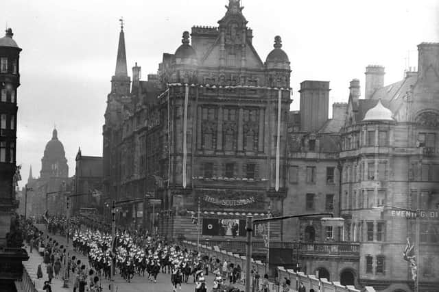 The Royal procession makes its way up North Bridge past The Scotsman offices when King Olav of Norway comes to  Edinburgh during his state visit to Scotland in October 1962. Picture: The Scotsman