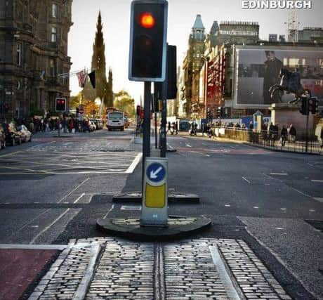 A stretch of surviving cable tram track still exists on Waterloo Place. Picture: Contributed