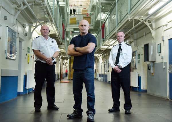 Ross Kemp flanked by prison guards. Picture: STV