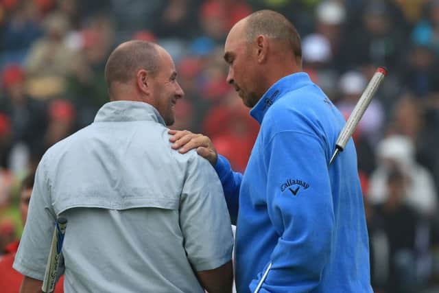 Scotland's Craig Lee, left, is consoled by Thomas Bjorn after the Dane beat him in a play-off at the 2013 Omega European Masters. Picture: Richard Heathcote/Getty Images