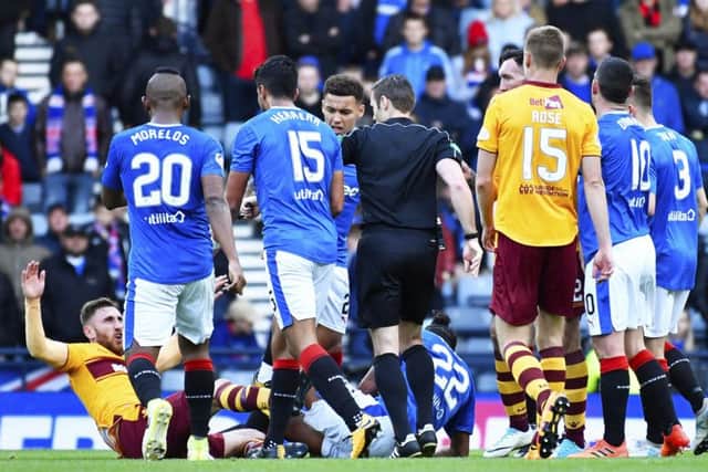 The aftermath of the clash between Bruno ALves and Louis Moult. Picture: Rob Casey/SNS