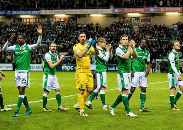 The victorious Hibs players after full-time. Picture: SNS