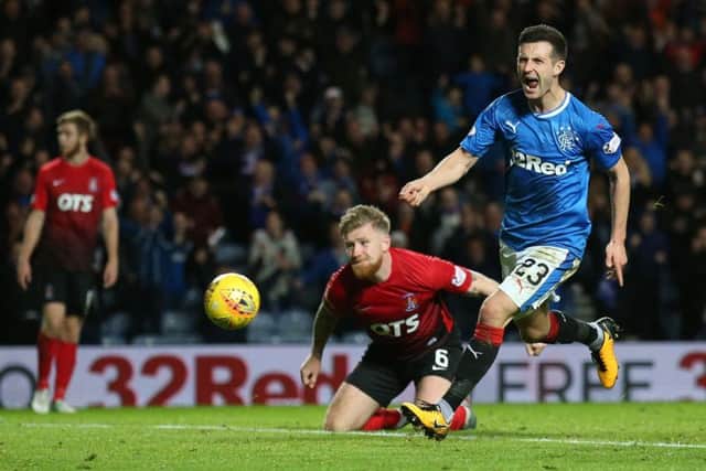 Jason Holt celebrates opening the scoring for Rangers. Picture: PA