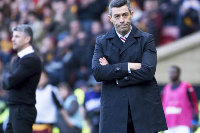Rangers manager Pedro Caixinha and, far left, Motherwell boss Stephen Robinson. Picture: SNS Group