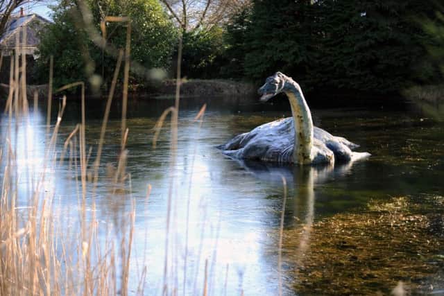 The Loch Ness monster is not only a mystery but also a tourist attraction  this model of Nessie is a feature at the Loch Ness Centre and Exhibition, Drumnadrochi. Picture: Jane Barlow
