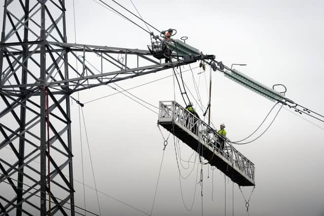 Contractors at work on the Beauly-Denny power line near Torwood in Larbert. Picture: Michael Gillen/TSPL