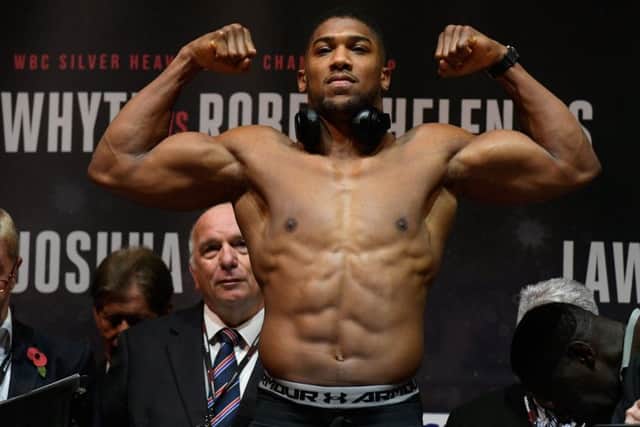 Anthony Joshua weighed in yesterday at a career-heaviest 18st 2lbs. Picture: Getty.