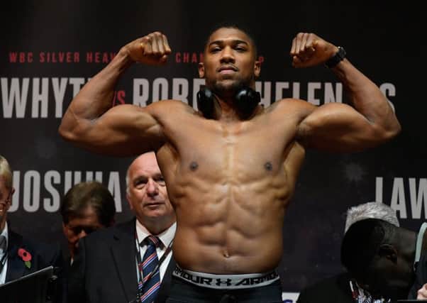 Anthony Joshua weighed in yesterday at a career-heaviest 18st 2lbs. Picture: Getty.