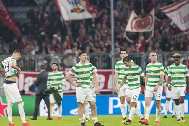 Celtic's players are left dejected at full time after being beaten by Bayern Munich. Picture: Craig Williamson/SNS