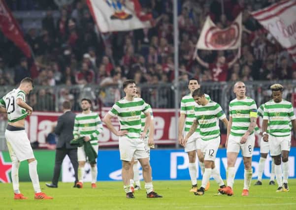Celtic's players are left dejected at full time after being beaten by Bayern Munich. Picture: Craig Williamson/SNS