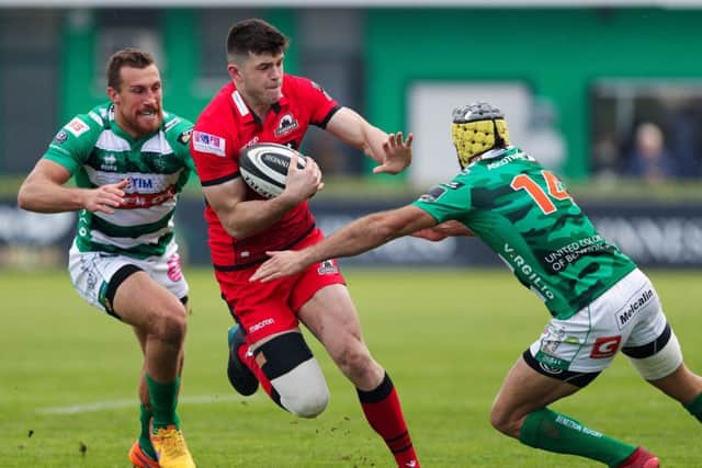 Benetton winger Angelo Esposito moves in to tackle full back Blair Kinghorn, who was involved in all three Edinburgh tries. Photograph: Roberto Bregani/Fotosport