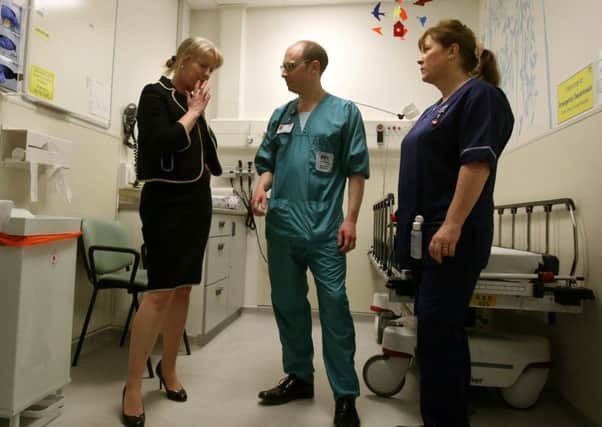Health Secretary Shona Robison chats with health staff at Forth Valley Royal Hospital in Larbert