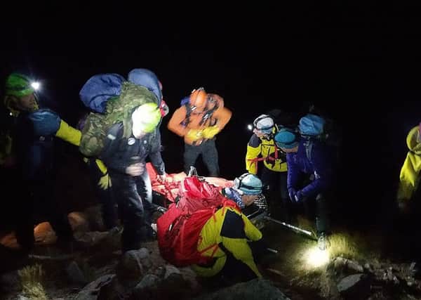 A seriously injured walker being brought to safety after an eight-hour rescue operation high in the Cairngorms. Picture: Cairngorm Mountain Rescue Team/PA Wire