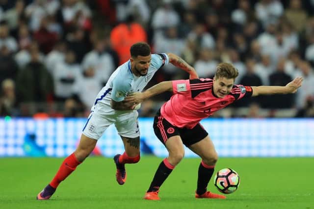 James Forrest and Kyle Walker wear the poppy emblem during the World Cup qualifier in November 2016. Picture: Getty Images
