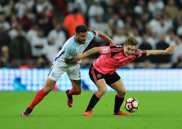 James Forrest and Kyle Walker wear the poppy emblem during the World Cup qualifier in November 2016. Picture: Getty Images