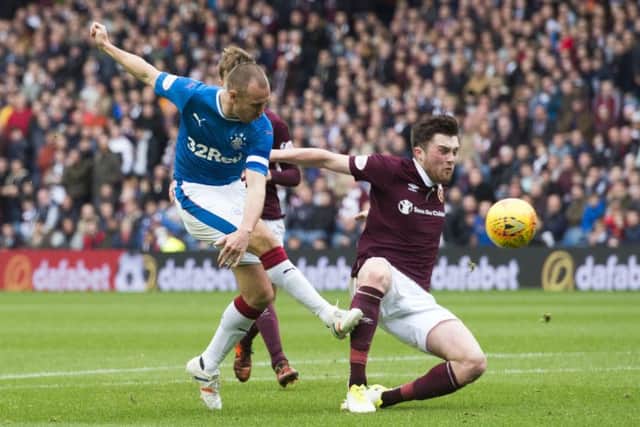 Kenny Miller, left, netted twice for Rangers in a 3-1 win over Hearts. Picture: SNS