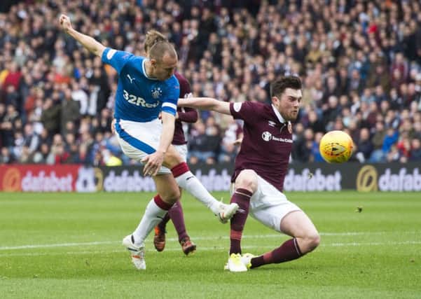 Kenny Miller, left, netted twice for Rangers in a 3-1 win over Hearts. Picture: SNS