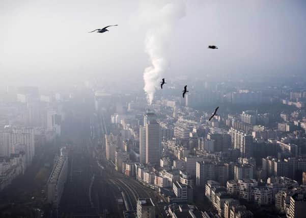 The Montparnasse Tower in Paris. 
The concentration of carbon dioxide (CO2) in the atmosphere reached a record level in 2016 according to the World Meteorological Organization (WMO). Picture: LIONEL BONAVENTURE/AFP/Getty Images