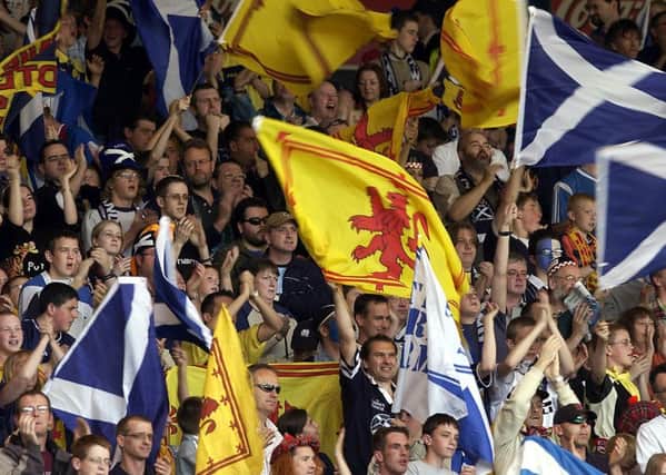 Members of the Tartan Army would define themselves partly by the fact they are not English. Picture: Ian Rutherford