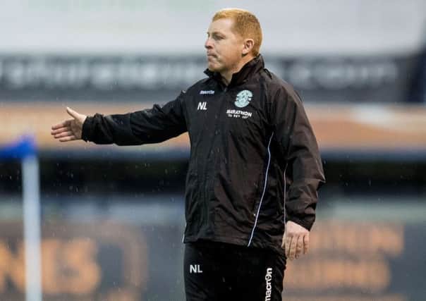 Manager Neil Lennon was delighted to see his side go third in the table. Picture: SNS.