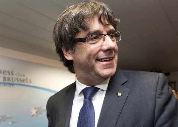 Sacked Catalonian President Carles Puigdemont will not return to Spain for questioning. Picture: AP Photo/Olivier Matthys