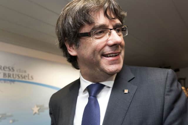 Sacked Catalonian President Carles Puigdemont will not return to Spain for questioning. Picture: AP Photo/Olivier Matthys
