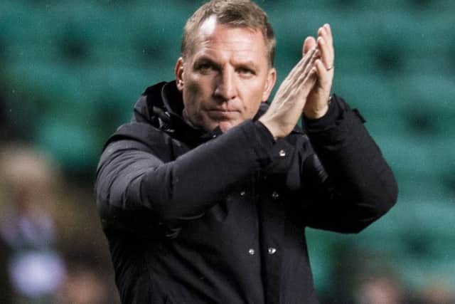 Manager Brendan Rodgers salutes the fans after Celtic's 2-1 defeat by Bayern Munich.