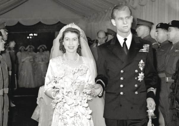 The Queen and the Duke of Edinburgh on their wedding day. Picture: PA/PA Wire