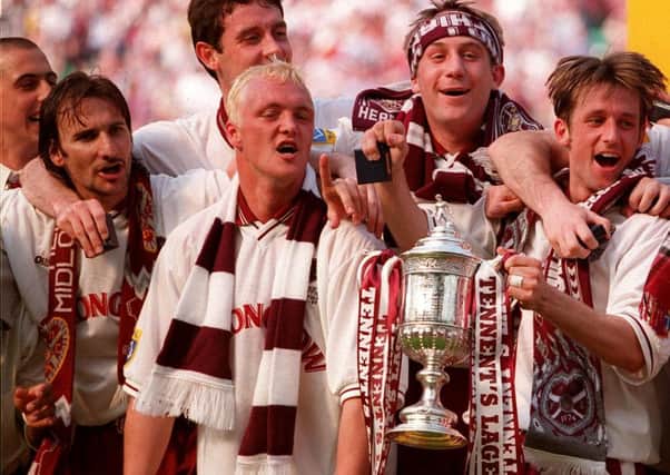 Stefano Salvatori, left, celebrates with his Hearts team-mates after their 1998 Scottish Cup final triumph. Picture: Robert Perry