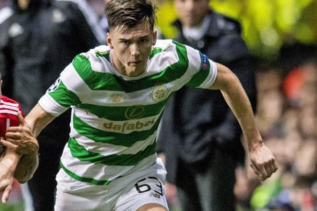 Celtic's Kieran  Tierney (R) in action with Bayern Munich's Rafinha. Picture: SNS/ Craig Williamson