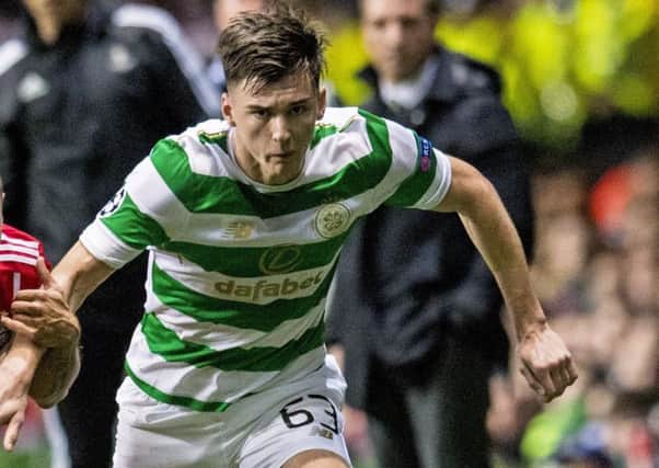 Celtic's Kieran Tierney (R) in action with Bayern Munich's Rafinha. Picture: SNS/ Craig Williamson