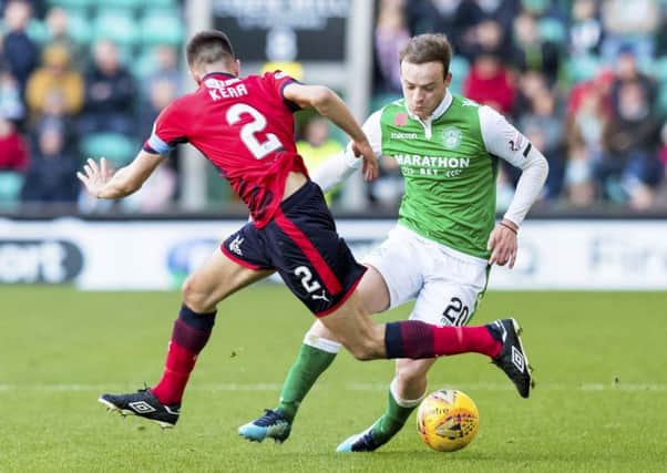 Hibs Brandon barker takes on Dundee's Cammy Kerr. Picture: SNS/Alan Rennie