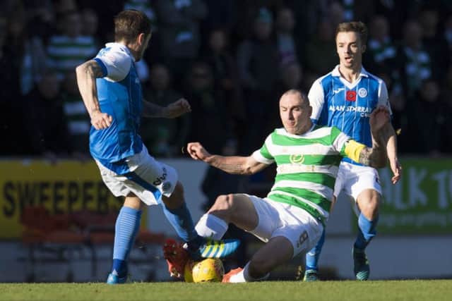 Stefan Scougall watches on as Scott Brown challenges Paul Paton. Picture: SNS/Craig Foy