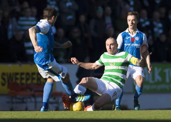 Stefan Scougall watches on as Scott Brown challenges Paul Paton. Picture: SNS/Craig Foy