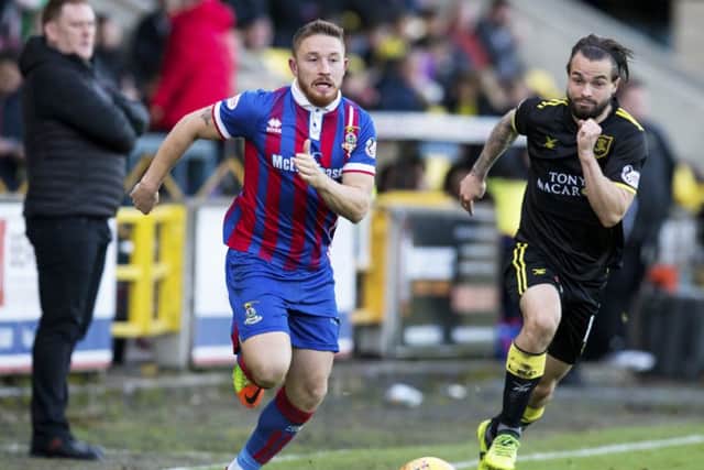 Inverness CT's John Baird is chased by Livingston's Keaghan Jacobs. Picture: SNS/Bruce White