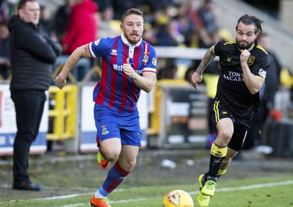 Inverness CT's John Baird is chased by Livingston's Keaghan Jacobs. Picture: SNS/Bruce White