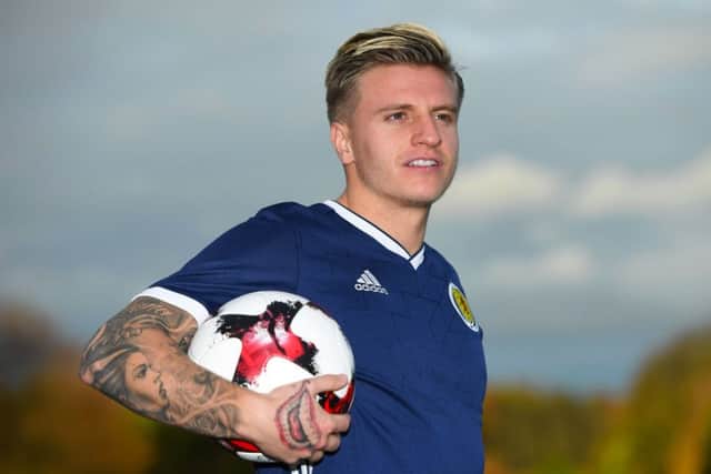 Jason Cummings launches the new Scotland home kit