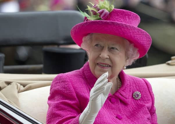 Queen Elizabeth may not appreciate finding herself in the company of Jimmy Carr. Picture: AP