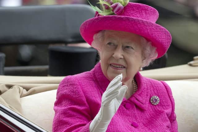 Queen Elizabeth may not appreciate finding herself in the company of Jimmy Carr. Picture: AP