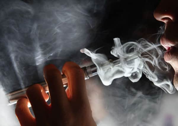 Pupils at a Highlands school have been drinking the vaping liquid used in e-cigarettes. Picture: Dan Kitwood/Getty Images